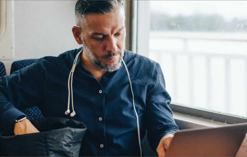 man working on laptop